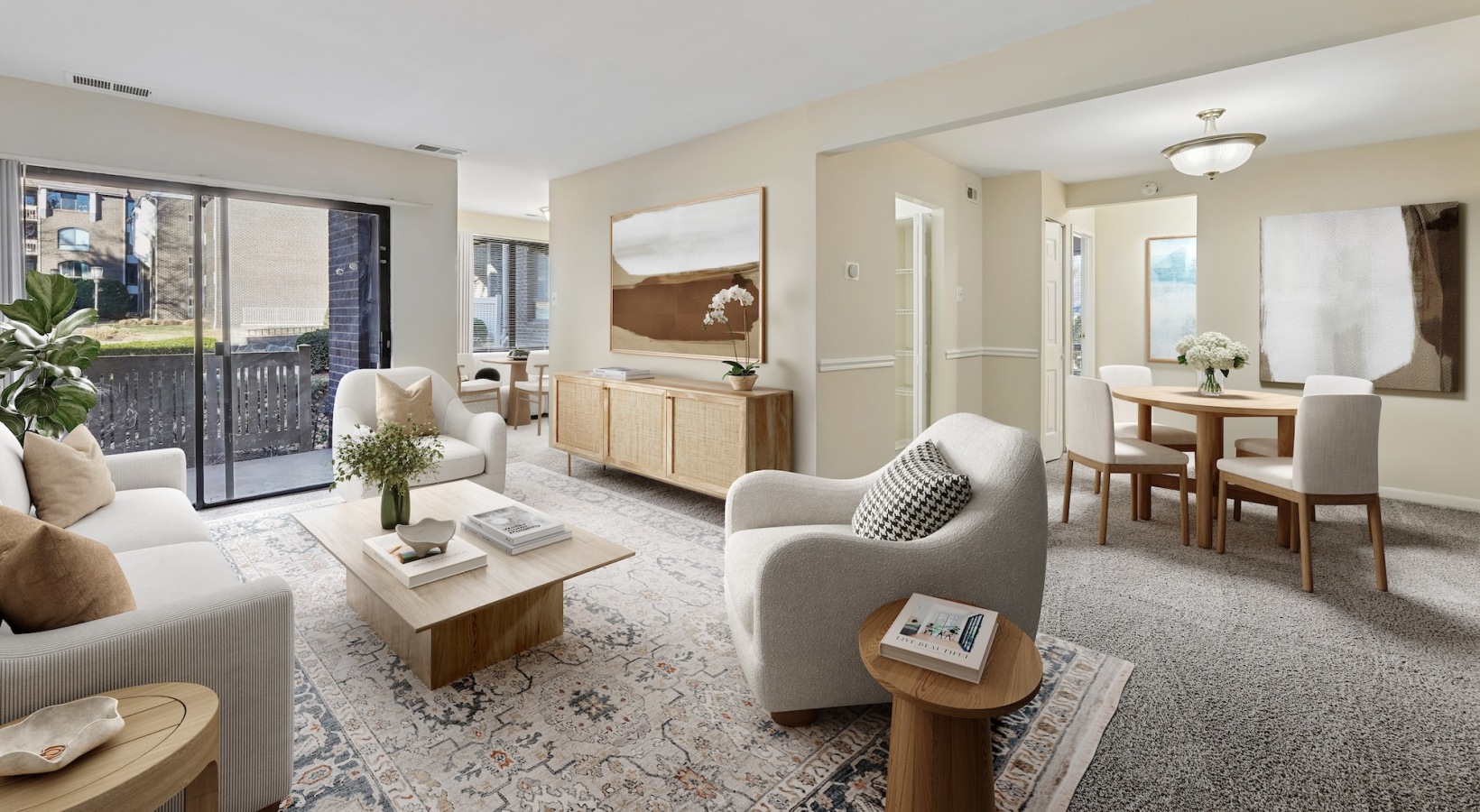 Apartment living room with couches and dining room table