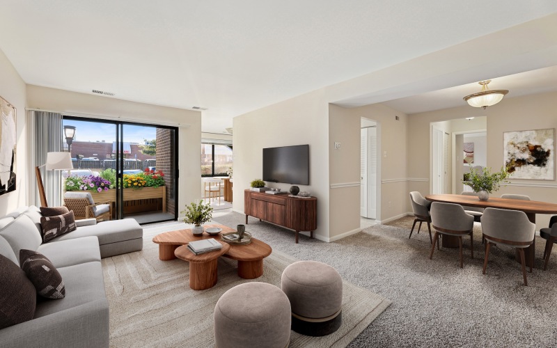 Living Room with carpet and couches